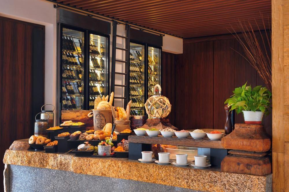 Oasia Resort Sentosa By Far East Hospitality Singapore Exterior photo A buffet at a hotel